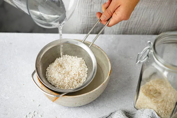 Rice Water
close-up-of-woman-hands-washing