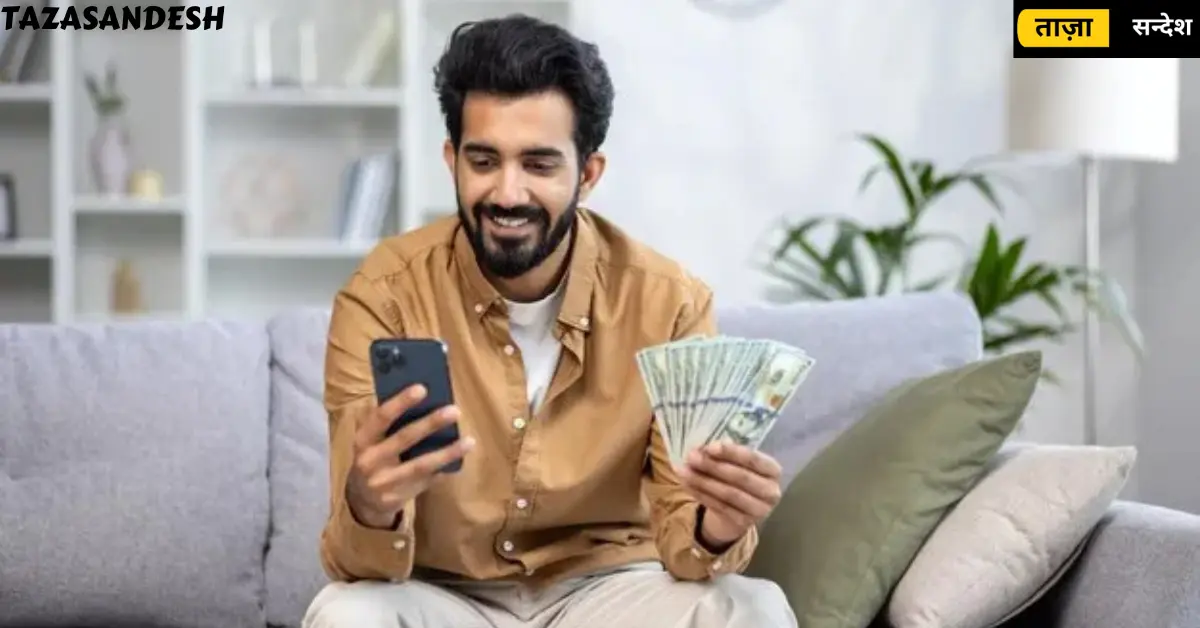 A boy sit on sofa and using mobile in your one hand and other hand hold a currency.